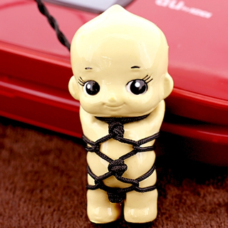 Illustration for article titled Kewpie Bondage Cellphone Charms Give Us Utterly Horrific Nightmares